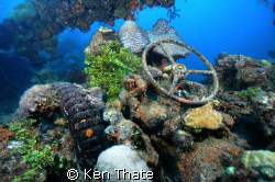 Pic of a truck shot on top of a wreck sunk in Truk Lagoon. by Ken Thate 
